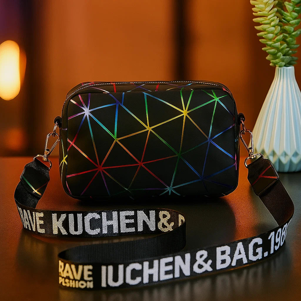 Black geometric-patterned bag with colorful accents on a dark surface, featuring 'Kuchen & Bag' branding.